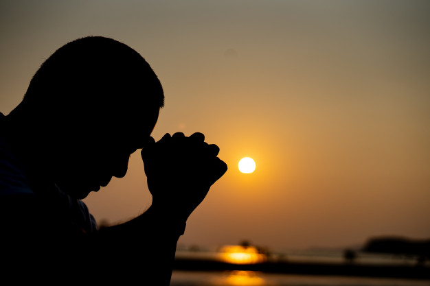 Praying at dusk